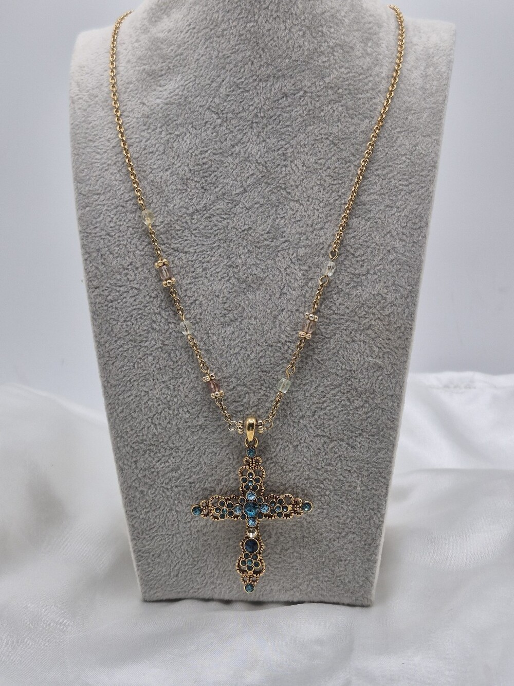 Avon SW Gold Tone Cross Pendant Necklace with Blue Crystal Accents